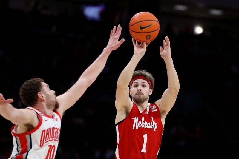 Feb 29, 2024; Columbus, Ohio, USA;  Nebraska Cornhuskers guard Sam Hoiberg (1) takes a three point shot as Ohio State Buckeyes forward Jamison Battle (10) defends during the first half at Value City Arena. Mandatory Credit: Joseph Maiorana-USA TODAY Sports