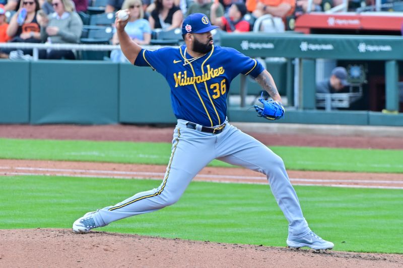 Mar 9, 2023; Scottsdale, Arizona, USA;  Milwaukee Brewers first baseman Owen Miller (6) throws in the third inning against the San Francisco Giants during a Spring Training game at Scottsdale Stadium. Mandatory Credit: Matt Kartozian-USA TODAY Sports