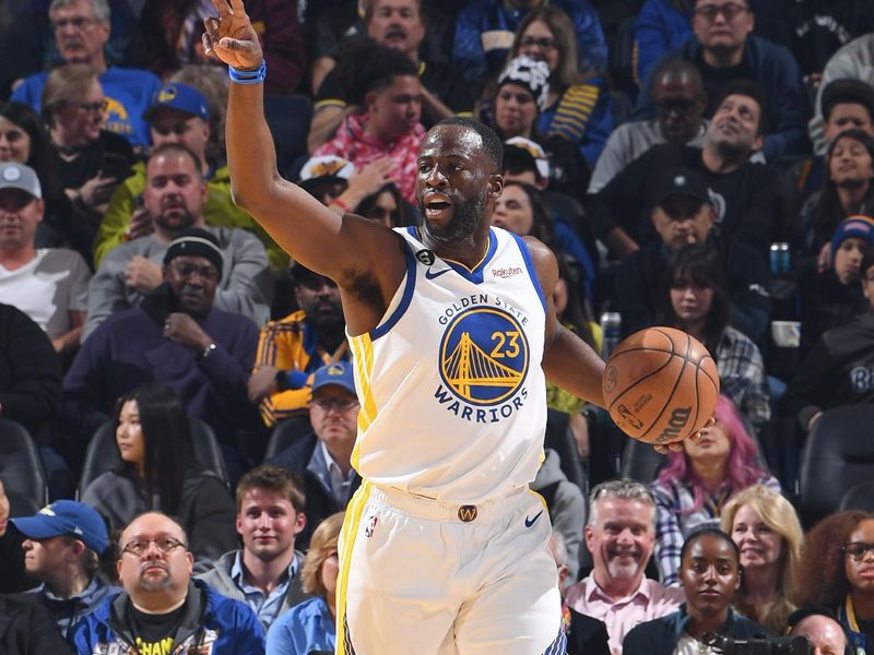 SAN FRANCISCO, CA - MARCH 24: Draymond Green #23 of the Golden State Warriors handles the ball during the game against the Philadelphia 76ers on March 24, 2023 at Chase Center in San Francisco, California. NOTE TO USER: User expressly acknowledges and agrees that, by downloading and or using this photograph, user is consenting to the terms and conditions of Getty Images License Agreement. Mandatory Copyright Notice: Copyright 2023 NBAE (Photo by Noah Graham/NBAE via Getty Images)