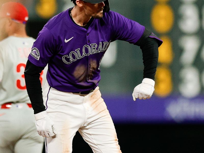 May 19, 2025; Denver, Colorado, USA; Colorado Rockies center fielder Brenton Doyle (9) reacts after hitting an RBI double in the sixth inning against the Philadelphia Phillies at Coors Field. Mandatory Credit: Isaiah J. Downing-Imagn Images