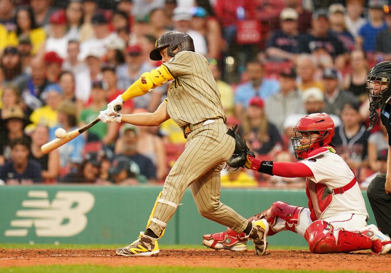 Jun 30, 2024; Boston, Massachusetts, USA; San Diego Padres shortstop Ha-Seong Kim (7) lines out to center field to end the game against the Boston Red Sox in the ninth inning at Fenway Park. Mandatory Credit: David Butler II-USA TODAY Sports