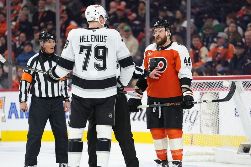 Jan 31, 2026; Philadelphia, Pennsylvania, USA; Philadelphia Flyers left wing Nicolas Deslauriers (44) reacts against Los Angeles Kings center Samuel Helenius (79) in the third period at Xfinity Mobile Arena. Mandatory Credit: Kyle Ross-Imagn Images