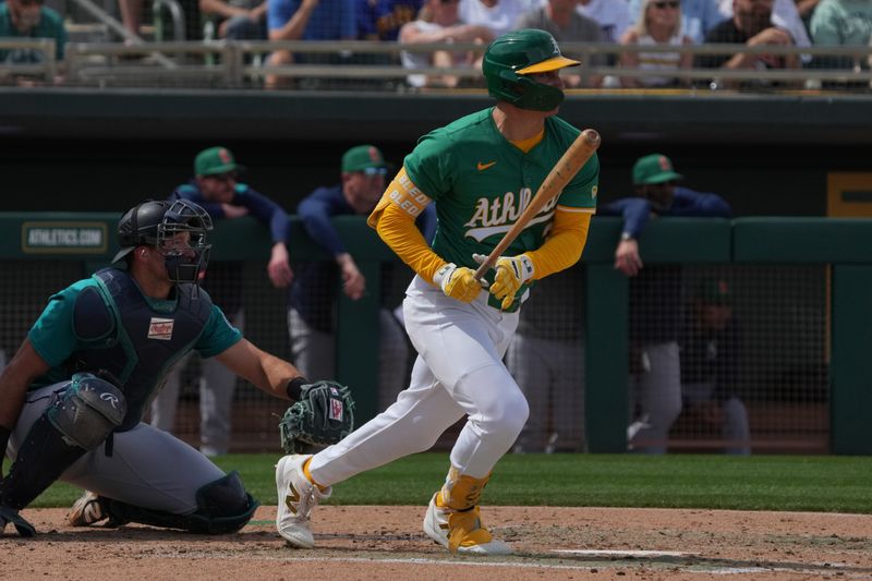 Athletics Swing Past Mariners: A Display of Precision and Power at Hohokam Stadium