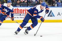 Islanders' Star Pierre Engvall Takes on Flames: A Showdown to Remember