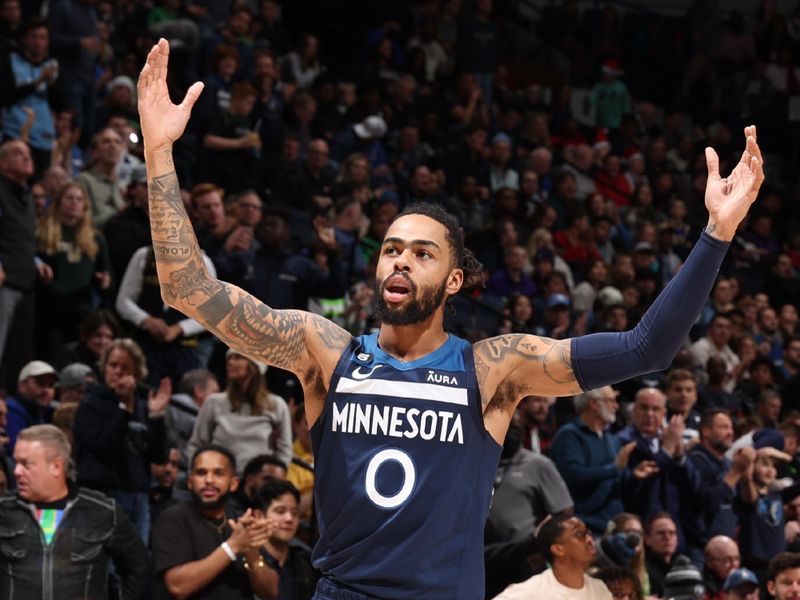 MINNEAPOLIS, MN -  DECEMBER 21: D'Angelo Russell #0 of the Minnesota Timberwolves looks on during the game against the Dallas Mavericks on December 21, 2022 at Target Center in Minneapolis, Minnesota. NOTE TO USER: User expressly acknowledges and agrees that, by downloading and or using this Photograph, user is consenting to the terms and conditions of the Getty Images License Agreement. Mandatory Copyright Notice: Copyright 2022 NBAE (Photo by David Sherman/NBAE via Getty Images)