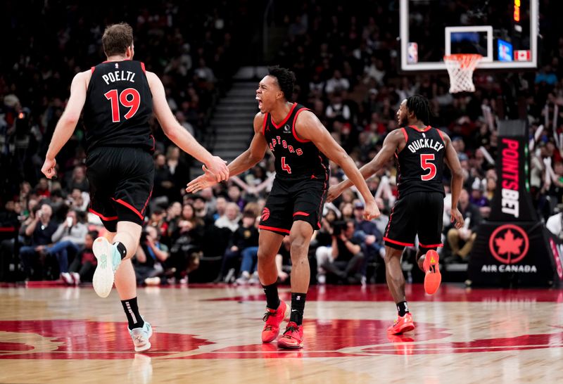 TORONTO, ON - FEBRUARY 10: Scottie Barnes #4 of the Toronto Raptors celebrates with Jakob Poeltl #19 and Immanuel Quickley #5 against the Cleveland Cavaliers during the second half of their basketball game at the Scotiabank Arena on February 10, 2024 in Toronto, Ontario, Canada. NOTE TO USER: User expressly acknowledges and agrees that, by downloading and/or using this Photograph, user is consenting to the terms and conditions of the Getty Images License Agreement. (Photo by Mark Blinch/Getty Images)