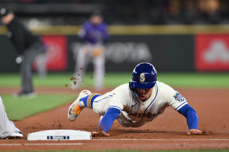 Apr 16, 2023; Seattle, Washington, USA; Seattle Mariners second baseman Kolten Wong (16) returns to first base during the third inning against the Colorado Rockies at T-Mobile Park. Mandatory Credit: Steven Bisig-USA TODAY Sports
