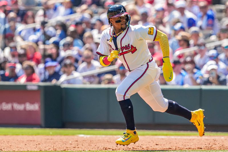 Apr 7, 2024; Cumberland, Georgia, USA; Atlanta Braves right fielder Ronald Acuna Jr (13) runs the bases against the Arizona Diamondbacks during the fifth inning at Truist Park. Mandatory Credit: Dale Zanine-USA TODAY Sports