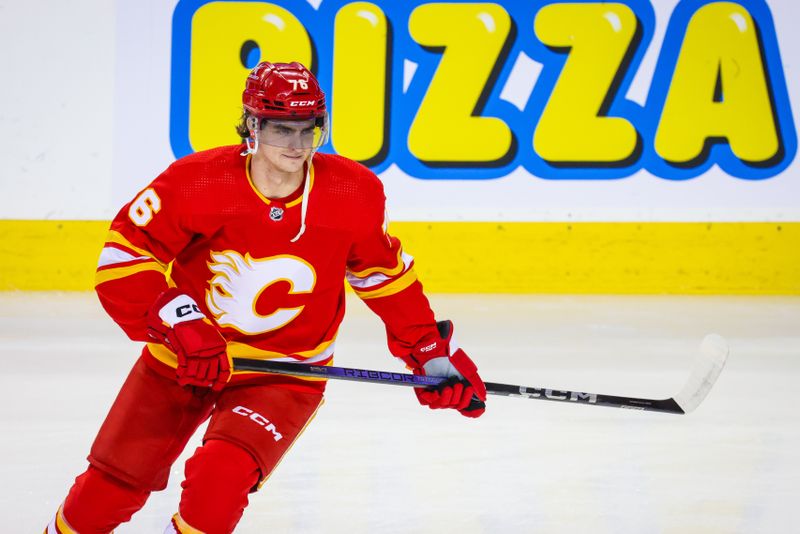 Dec 27, 2023; Calgary, Alberta, CAN; Calgary Flames center Martin Pospisil (76) skates during the warmup period against the Seattle Kraken at Scotiabank Saddledome. Mandatory Credit: Sergei Belski-USA TODAY Sports