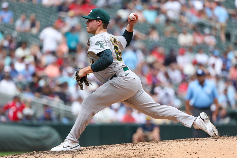 Jun 16, 2024; Minneapolis, Minnesota, USA; Oakland Athletics pitcher Vinny Nittoli (64) delivers a pitch against the Minnesota Twins during the sixth inning of game one of a double header at Target Field. Mandatory Credit: Matt Krohn-USA TODAY Sports