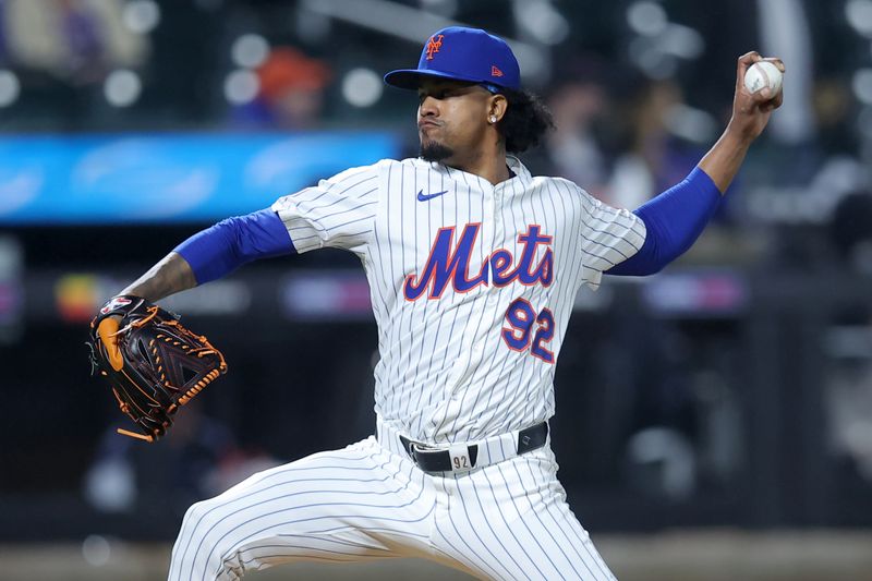 May 14, 2025; New York City, New York, USA; New York Mets relief pitcher Genesis Cabrera (92) pitches against the Pittsburgh Pirates during the seventh inning at Citi Field. Mandatory Credit: Brad Penner-Imagn Images