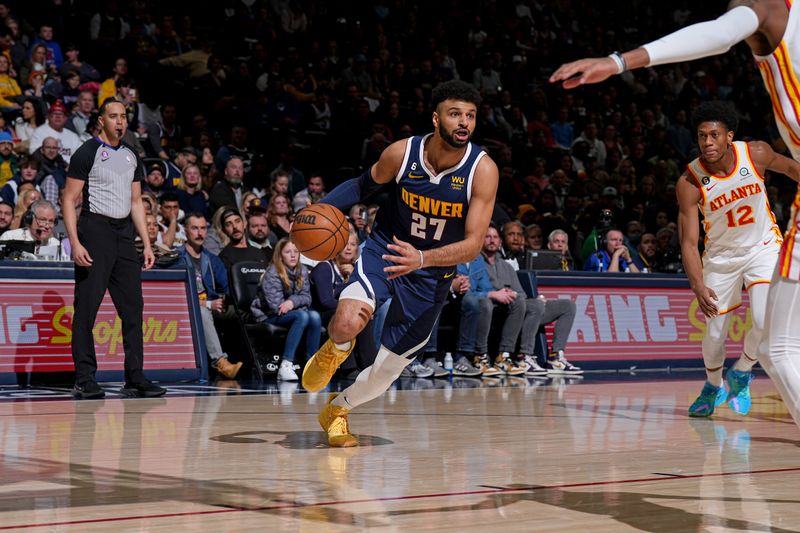 DENVER, CO - FEBRUARY 4: Jamal Murray #27 of the Denver Nuggets drives to the basket against the Atlanta Hawks on February 4, 2023 at the Ball Arena in Denver, Colorado. NOTE TO USER: User expressly acknowledges and agrees that, by downloading and/or using this Photograph, user is consenting to the terms and conditions of the Getty Images License Agreement. Mandatory Copyright Notice: Copyright 2022 NBAE (Photo by Garrett Ellwood/NBAE via Getty Images)