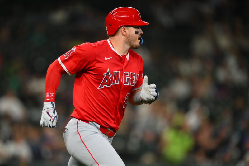 Sep 11, 2025; Seattle, Washington, USA; Los Angeles Angels designated hitter Mike Trout (27) runs the bases after hitting a home run against the Seattle Mariners during the fifth inning at T-Mobile Park. Mandatory Credit: Steven Bisig-Imagn Images