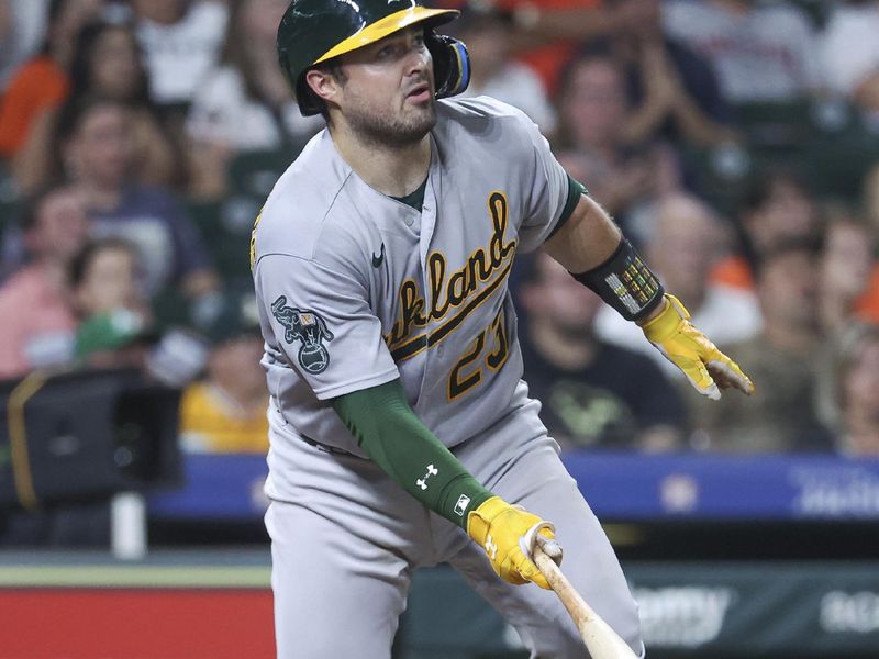 Sep 11, 2023; Houston, Texas, USA; Oakland Athletics catcher Shea Langeliers (23) hits a home run during the seventh inning against the Houston Astros at Minute Maid Park. Mandatory Credit: Troy Taormina-USA TODAY Sports