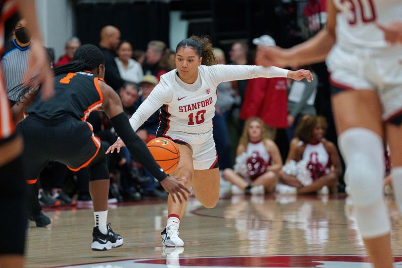 Jan 27, 2023; Stanford, California, USA; Oregon State Beavers guard Bendu Yeaney (1) reaches for a loose ball from Stanford Cardinal guard Talana Lepolo (10) during the first quarter at Maples Pavilion. Mandatory Credit: Neville E. Guard-USA TODAY Sports