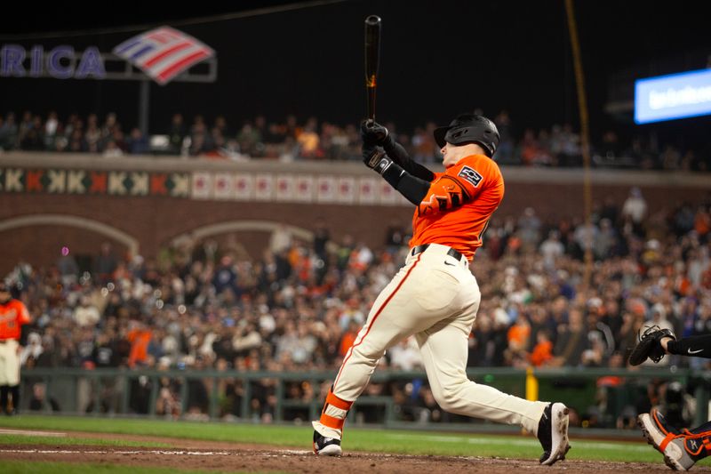 Aug 9, 2024; San Francisco, California, USA; San Francisco Giants designated hitter Mark Canha (16) hits a sacrifice fly against the Detroit Tigers during the ninth inning at Oracle Park. Mandatory Credit: D. Ross Cameron-USA TODAY Sports