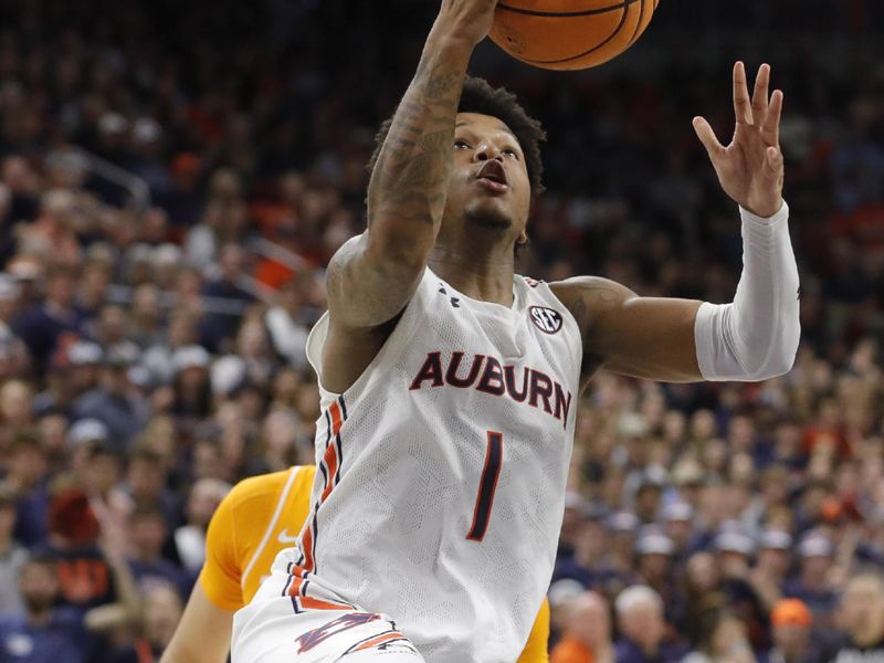 Mar 4, 2023; Auburn, Alabama, USA;  Auburn Tigers guard Wendell Green Jr. (1) shoots the ball against the Tennessee Volunteers during the second half at Neville Arena. Mandatory Credit: John Reed-USA TODAY Sports