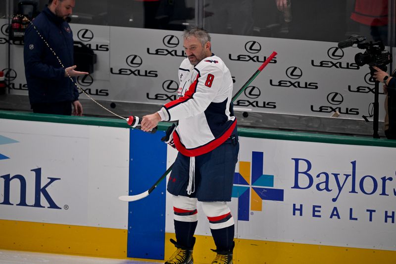 Oct 28, 2025; Dallas, Texas, USA; Washington Capitals left wing Alex Ovechkin (8) sprays a water bottle as he skates in warmups before the game against the Dallas Stars at the American Airlines Center. Mandatory Credit: Jerome Miron-Imagn Images