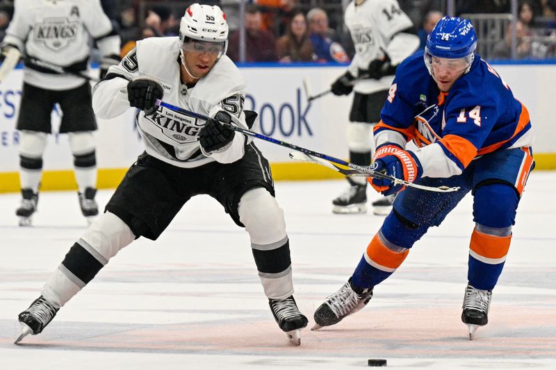 Mar 13, 2026; Elmont, New York, USA; New York Islanders center Bo Horvat (14) and Los Angeles Kings right wing Quinton Byfield (55) battle for a loose puck during the third period at UBS Arena. Mandatory Credit: Dennis Schneidler-Imagn Images