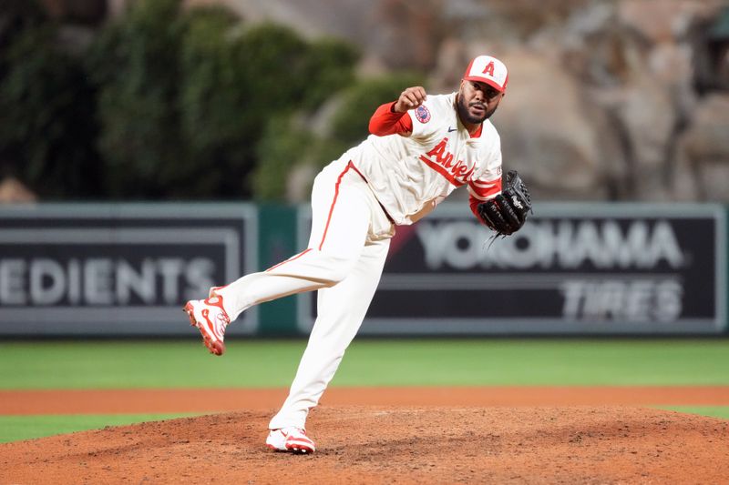 Jun 7, 2025; Anaheim, California, USA; Los Angeles Angels relief pitcher Kenley Jansen (74) throws in the ninth inning against the Seattle Mariners at Angel Stadium. Mandatory Credit: Kirby Lee-Imagn Images
