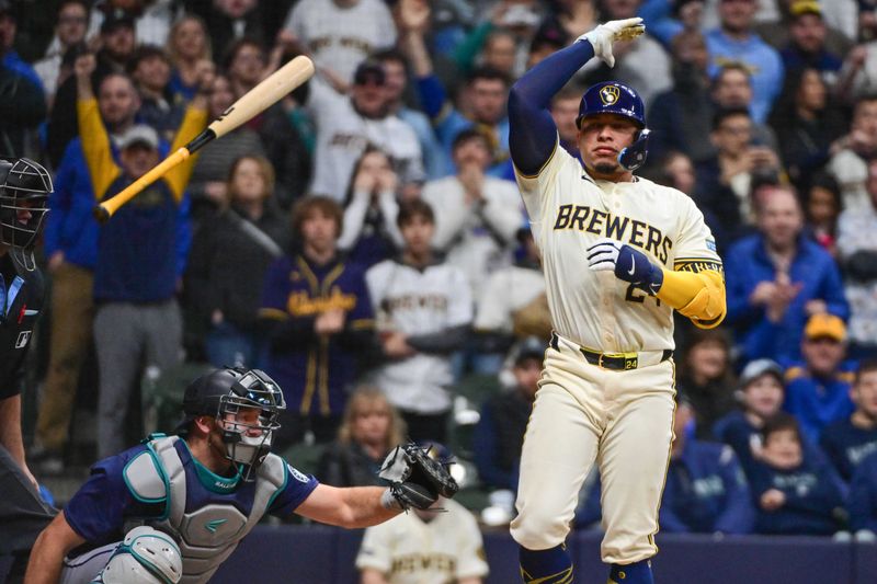 Apr 5, 2024; Milwaukee, Wisconsin, USA; Milwaukee Brewers catcher William Contreras (24) reacts after drawing a walk with the bases loaded to force in the winning run in the ninth inning against the Seattle Mariners at American Family Field. Mandatory Credit: Benny Sieu-USA TODAY Sports