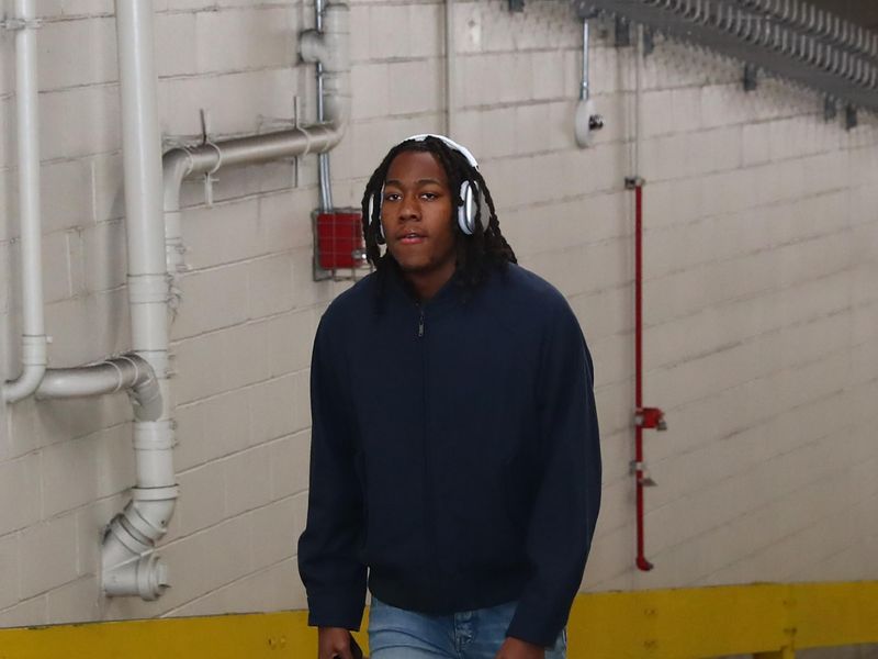 NEW YORK, NY - JANUARY 3: Ayo Dosunmu #12 of the Chicago Bulls arrives to the arena before the game against the New York Knicks on January 3, 2024 at Madison Square Garden in New York City, New York.  NOTE TO USER: User expressly acknowledges and agrees that, by downloading and or using this photograph, User is consenting to the terms and conditions of the Getty Images License Agreement. Mandatory Copyright Notice: Copyright 2024 NBAE  (Photo by David L. Nemec/NBAE via Getty Images)