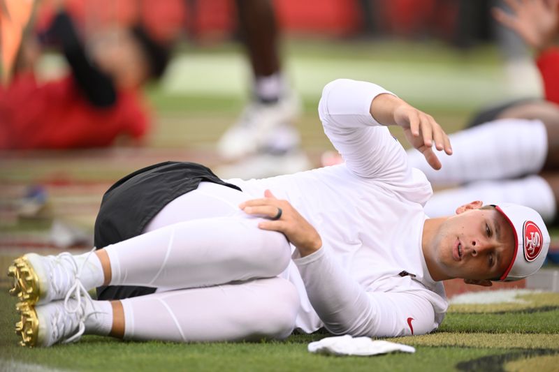 San Francisco 49ers quarterback Brock Purdy warms up before an NFL football game against the Dallas Cowboys in Santa Clara, Calif., Sunday, Oct. 27, 2024. (AP Photo/Eakin Howard)