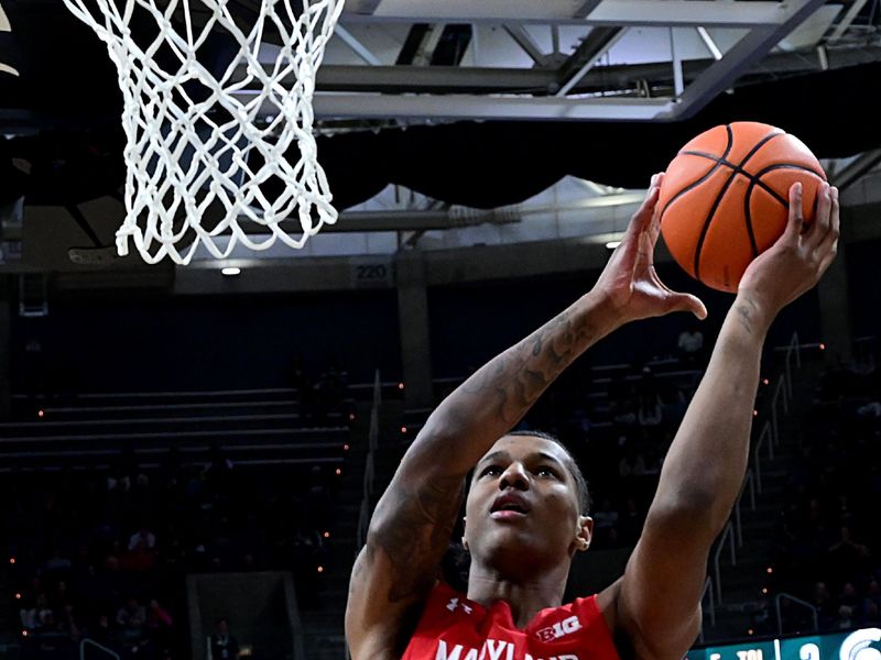 Feb 7, 2023; East Lansing, Michigan, USA; Maryland Terrapins forward Julian Reese (10) scores in the first half against the Michigan State Spartans at Jack Breslin Student Events Center. Mandatory Credit: Dale Young-USA TODAY Sports