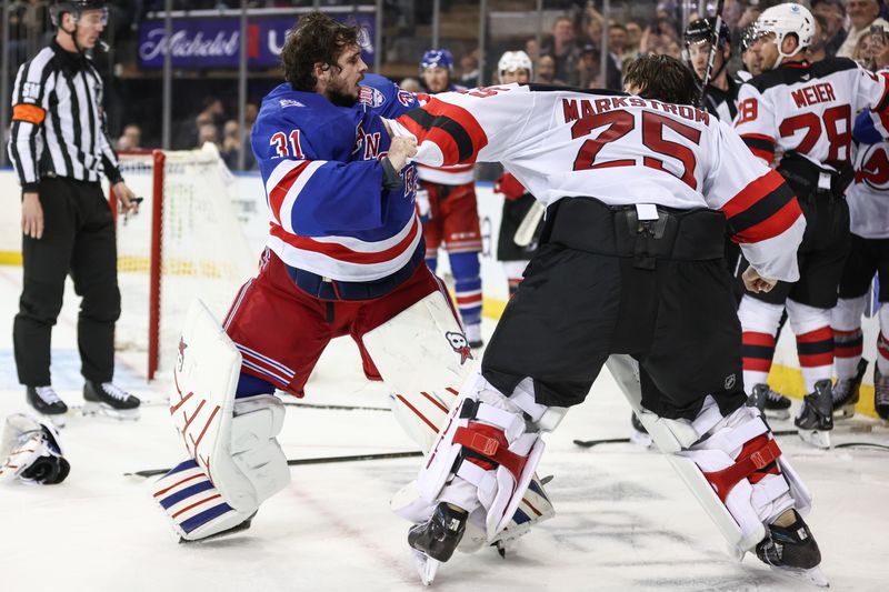 Mar 31, 2026; New York, New York, USA; New York Rangers goaltender Igor Shesterkin (31) and New Jersey Devils goaltender Jacob Markstrom (25) fight in the third period at Madison Square Garden. Mandatory Credit: Wendell Cruz-Imagn Images Mar 31, 2026; New York, New York, USA; New York Rangers goaltender Igor Shesterkin (31) and New Jersey Devils goaltender Jacob Markstrom (25) fight in the third period at Madison Square Garden. Mandatory Credit: Wendell Cruz-Imagn Images