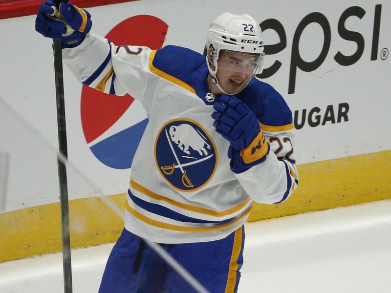 Sep 25, 2022; Washington, District of Columbia, USA; Buffalo Sabres right wing Jack Quinn (22) celebrates after scoring a goal against the Washington Capitals during the second period at Capital One Arena. Mandatory Credit: Amber Searls-USA TODAY Sports