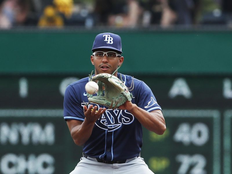 Jun 23, 2024; Pittsburgh, Pennsylvania, USA;  Tampa Bay Rays second baseman Richie Palacios (1) takes a throw at second base to begin a double play against the Pittsburgh Pirates during the second inning at PNC Park. Mandatory Credit: Charles LeClaire-USA TODAY Sports