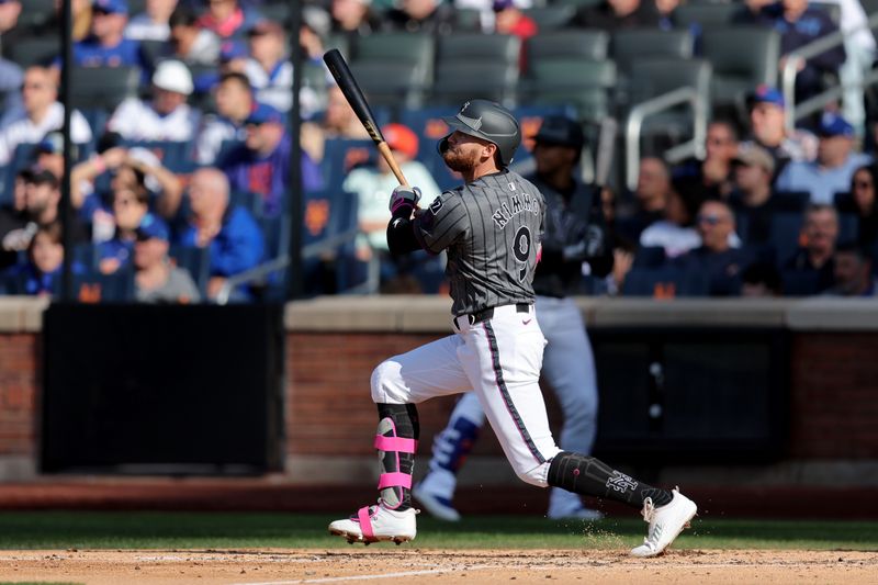 May 31, 2025; New York City, New York, USA; New York Mets left fielder Brandon Nimmo (9) follows through on a two run home run against the Colorado Rockies during the fourth inning at Citi Field. Mandatory Credit: Brad Penner-Imagn Images