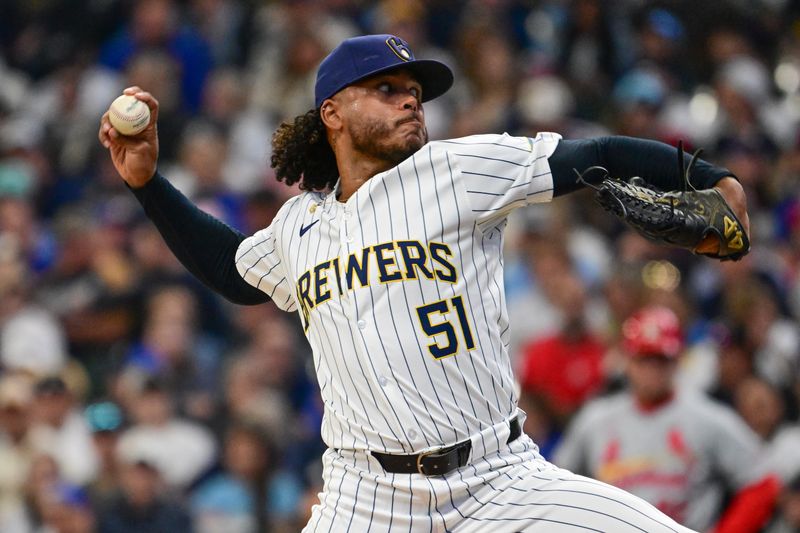 May 11, 2024; Milwaukee, Wisconsin, USA;  Milwaukee Brewers pitcher Freddy Peralta (51) throws against the St. Louis Cardinals in the first inning at American Family Field. Mandatory Credit: Benny Sieu-USA TODAY Sports