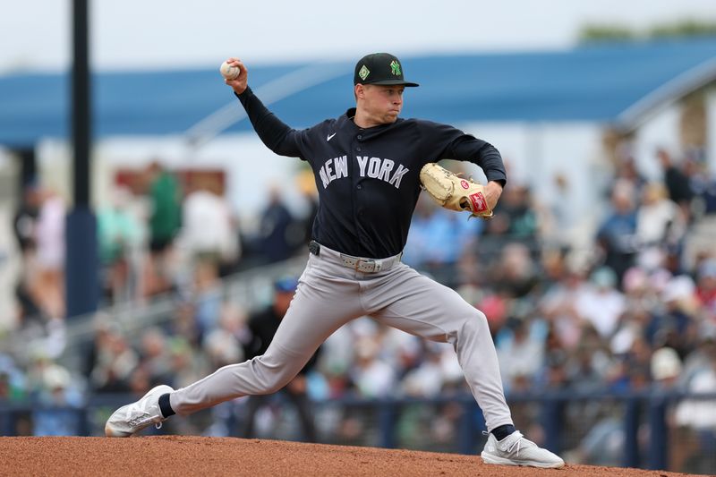 Mar 17, 2026; Port Charlotte, Florida, USA; New York Yankees starting pitcher Will Warren (98) throws a pitch against the Tampa Bay Rays in the first inning during spring training at Charlotte Sports Park. Mandatory Credit: Nathan Ray Seebeck-Imagn Images