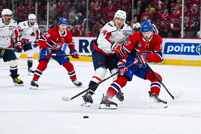 Apr 27, 2025; Montreal, Quebec, CAN; Washington Capitals defenseman John Carlson (74) defends against Montreal Canadiens right wing Josh Anderson (17) during the first period in game four of the first round of the 2025 Stanley Cup Playoffs at Bell Centre. Mandatory Credit: David Kirouac-Imagn Images