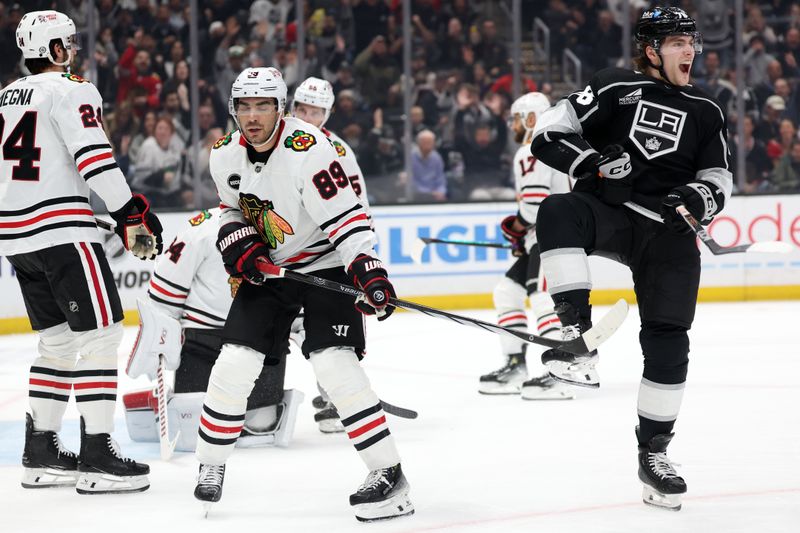 Mar 19, 2024; Los Angeles, California, USA;  Los Angeles Kings right wing Alex Laferriere (78) reacts after scoring a goal against Chicago Blackhawks goaltender Petr Mrazek (34) during the first period at Crypto.com Arena. Mandatory Credit: Kiyoshi Mio-USA TODAY Sports