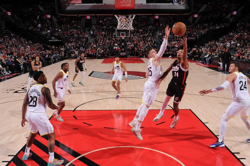 PORTLAND, OR - DECEMBER 6: Kris Murray #24 of the Portland Trail Blazers drives to the basket during the game against the Utah Jazz on December 6, 2024 at the Moda Center Arena in Portland, Oregon. NOTE TO USER: User expressly acknowledges and agrees that, by downloading and or using this photograph, user is consenting to the terms and conditions of the Getty Images License Agreement. Mandatory Copyright Notice: Copyright 2024 NBAE (Photo by Cameron Browne/NBAE via Getty Images)