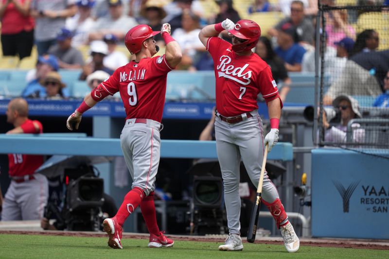 Jul 30, 2023; Los Angeles, California, USA; Cincinnati Reds shortstop Matt McLain (9) celebrates with first baseman Spencer Steer (7) after hitting a home run in the third inning against the Los Angeles Dodgers at Dodger Stadium. Mandatory Credit: Kirby Lee-USA TODAY Sports