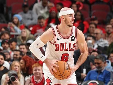CHICAGO, IL - DECEMBER 6: Alex Caruso #6 of the Chicago Bulls handles the ball during the game against the Charlotte Hornets on December 6, 2023 at the United Center in Chicago, Illinois. NOTE TO USER: User expressly acknowledges and agrees that, by downloading and or using this Photograph, user is consenting to the terms and conditions of the Getty Images License Agreement. Mandatory Copyright Notice: Copyright 2023 NBAE (Photo by Gary Dineen/NBAE via Getty Images).