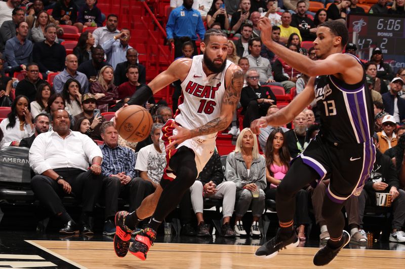 MIAMI, FL - JANUARY 31: Caleb Martin #16 of the Miami Heat handles the ball during the game  against the Sacramento Kings on January 31, 2024 at Kaseya Center in Miami, Florida. NOTE TO USER: User expressly acknowledges and agrees that, by downloading and or using this Photograph, user is consenting to the terms and conditions of the Getty Images License Agreement. Mandatory Copyright Notice: Copyright 2024 NBAE (Photo by Issac Baldizon/NBAE via Getty Images)