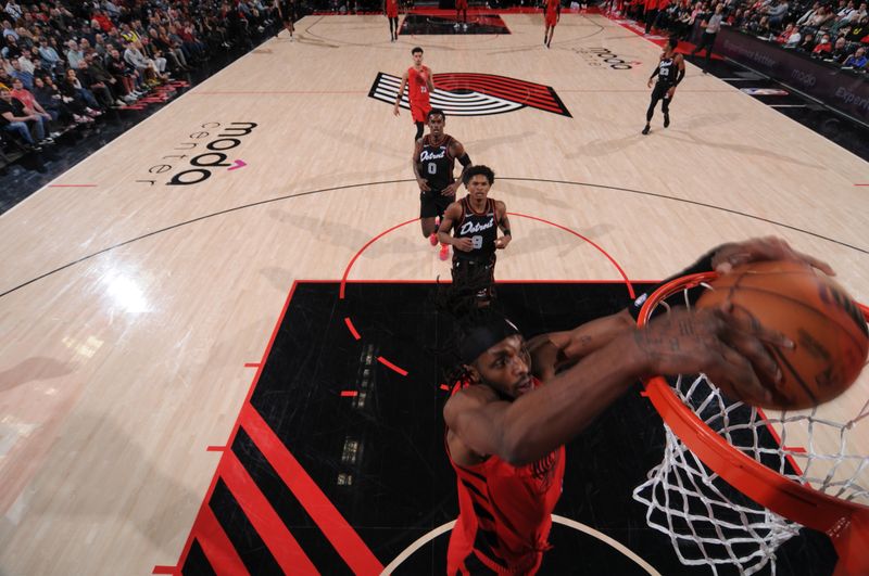 PORTLAND, OR - FEBRUARY 8: Jerami Grant #9 of the Portland Trail Blazers dunks the ball during the game against the Detroit Pistons on February 8, 2024 at the Moda Center Arena in Portland, Oregon. NOTE TO USER: User expressly acknowledges and agrees that, by downloading and or using this photograph, user is consenting to the terms and conditions of the Getty Images License Agreement. Mandatory Copyright Notice: Copyright 2024 NBAE (Photo by Cameron Browne/NBAE via Getty Images)