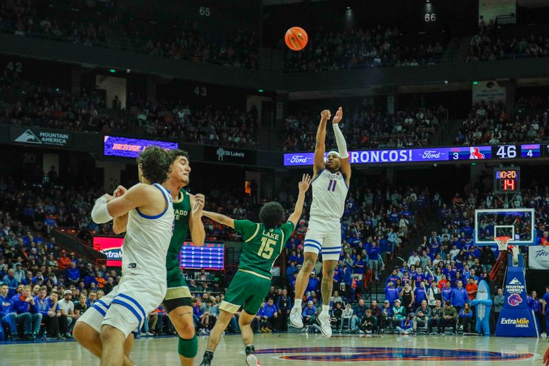 Jan 9, 2024; Boise, Idaho, USA; Boise State Broncos guard Chibuzo Agbo (11) shoots the ball during the second half against the Colorado State Rams at ExtraMile Arena. Mandatory Credit: Brian Losness-USA TODAY Sports

