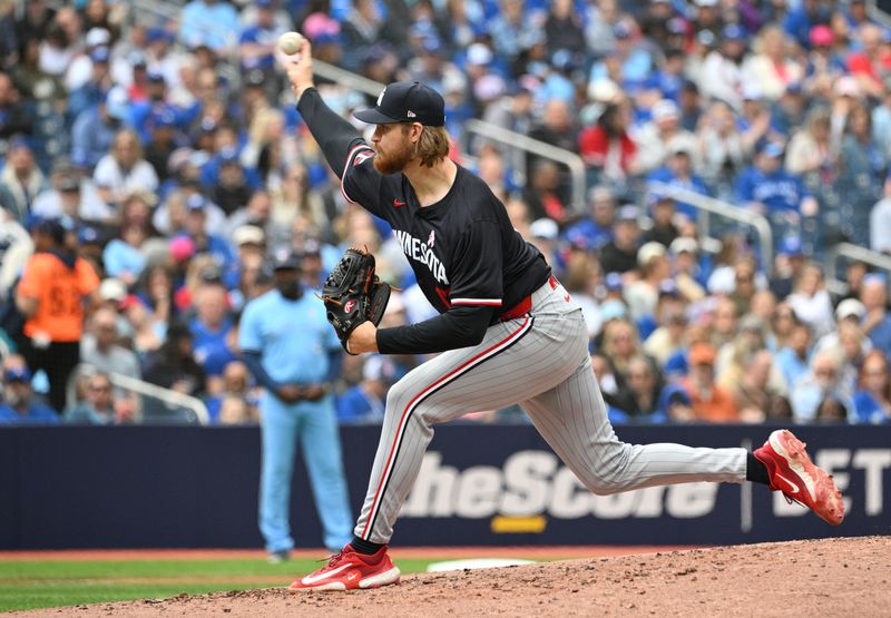 May 12, 2024; Toronto, Ontario, CAN;  Minnesota Twins starting pitcher Bailey Ober (17) delivers a pitch against the Toronto Blue Jays in the third inning at Rogers Centre. Mandatory Credit: Dan Hamilton-USA TODAY Sports