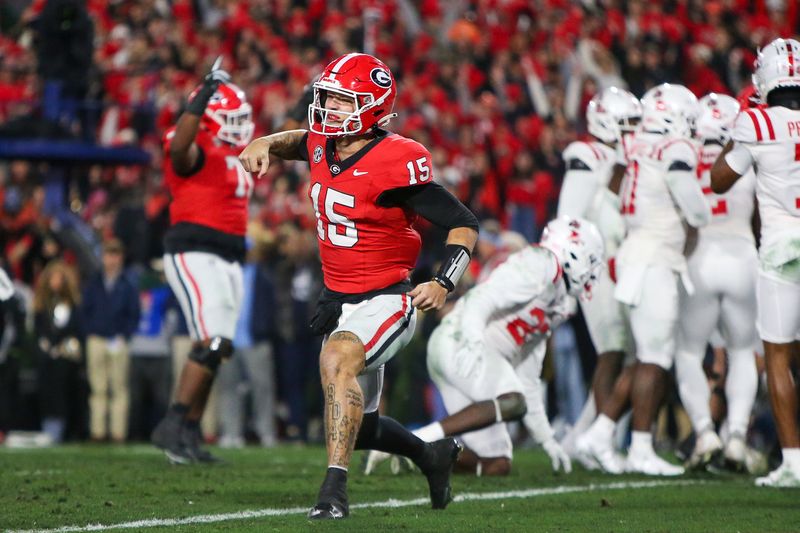 Nov 11, 2023; Athens, Georgia, USA; Georgia Bulldogs quarterback Carson Beck (15) celebrates after a touchdown against the Mississippi Rebels in the second quarter at Sanford Stadium. Mandatory Credit: Brett Davis-USA TODAY Sports
