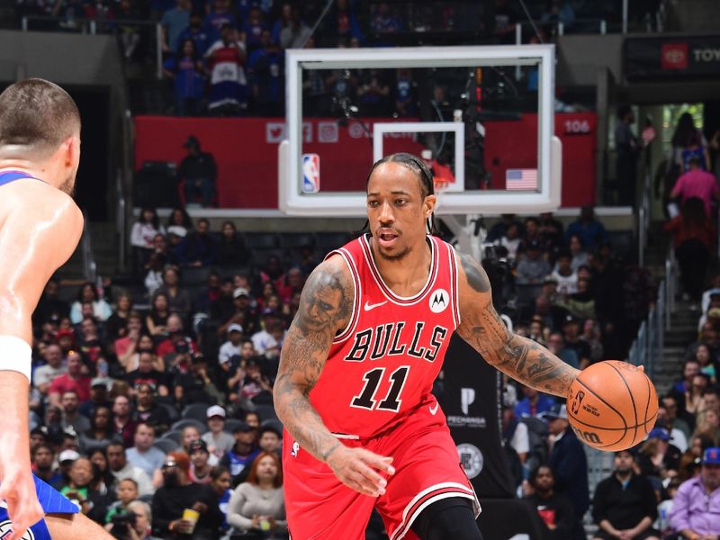 LOS ANGELES, CA - MARCH 9: DeMar DeRozan #11 of the Chicago Bulls dribbles the ball during the game against the LA Clippers on March 9, 2024 at Crypto.Com Arena in Los Angeles, California. NOTE TO USER: User expressly acknowledges and agrees that, by downloading and/or using this Photograph, user is consenting to the terms and conditions of the Getty Images License Agreement. Mandatory Copyright Notice: Copyright 2024 NBAE (Photo by Adam Pantozzi/NBAE via Getty Images)