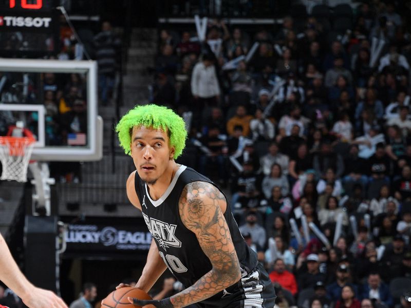 SAN ANTONIO, TX - DECEMBER 5: Jeremy Sochan #10 of the San Antonio Spurs handles the ball during the game against the Chicago Bulls on December 5, 2024 at the Frost Bank Center in San Antonio, Texas. NOTE TO USER: User expressly acknowledges and agrees that, by downloading and or using this photograph, user is consenting to the terms and conditions of the Getty Images License Agreement. Mandatory Copyright Notice: Copyright 2024 NBAE (Photos by Michael Gonzales/NBAE via Getty Images)