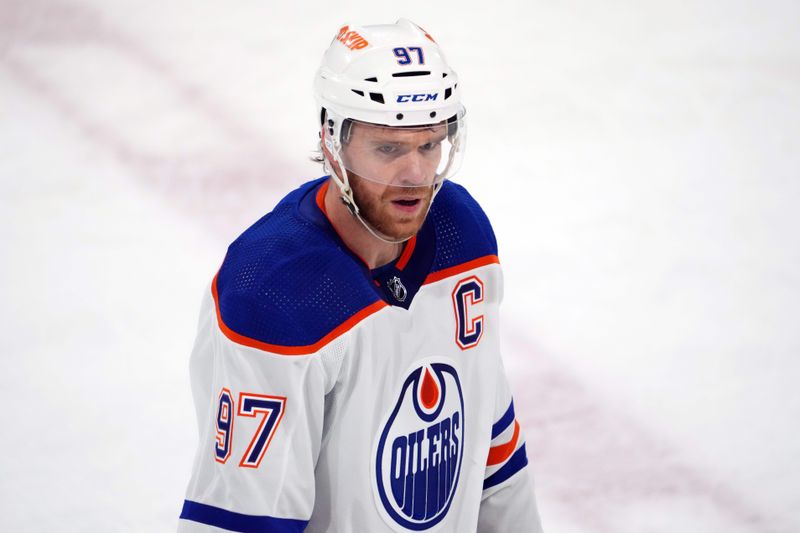 Feb 19, 2024; Tempe, Arizona, USA; Edmonton Oilers center Connor McDavid (97) skates against the Arizona Coyotes during the first period at Mullett Arena. Mandatory Credit: Joe Camporeale-USA TODAY Sports