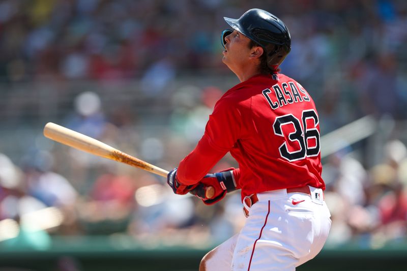 Mar 28, 2023; Fort Myers, Florida, USA;  Boston Red Sox first baseman Triston Casas (36) hits a home run against the Atlanta Braves in the second inning during spring training at JetBlue Park at Fenway South. Mandatory Credit: Nathan Ray Seebeck-USA TODAY Sports