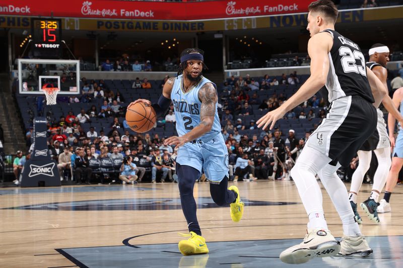 MEMPHIS, TN - APRIL 9: Zavier Simpson #2 of the Memphis Grizzlies dribbles the ball during the game against the San Antonio Spurs   on April 9, 2024 at FedExForum in Memphis, Tennessee. NOTE TO USER: User expressly acknowledges and agrees that, by downloading and or using this photograph, User is consenting to the terms and conditions of the Getty Images License Agreement. Mandatory Copyright Notice: Copyright 2024 NBAE (Photo by Joe Murphy/NBAE via Getty Images)