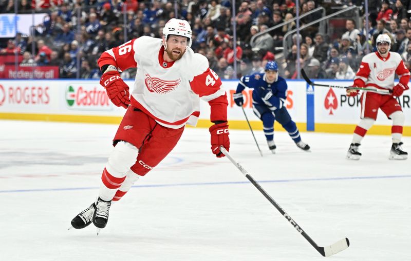 Jan 14, 2024; Toronto, Ontario, CAN;  Detroit Red Wings defenseman Jeff Petry (46) pursues the play against the Toronto Maple Leafs in the third period at Scotiabank Arena. Mandatory Credit: Dan Hamilton-USA TODAY Sports